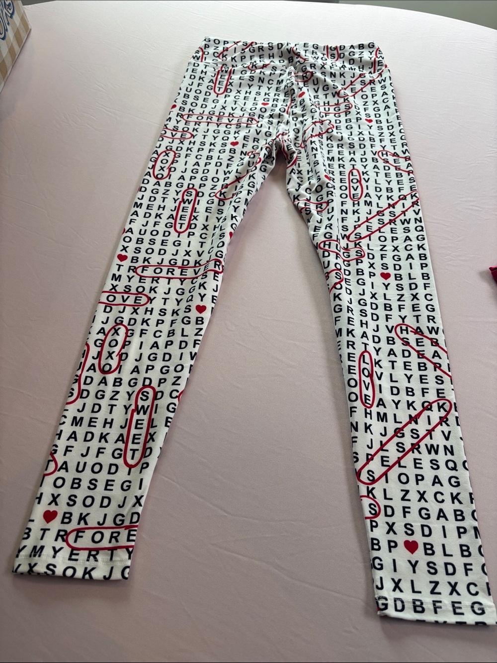 LuLaRoe White Letter-Pattern Leggings with Red Accents